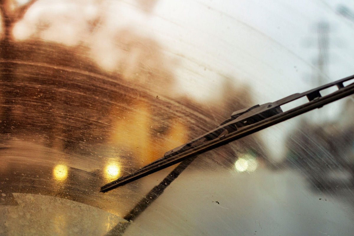 Wiper blade moving across windscreen